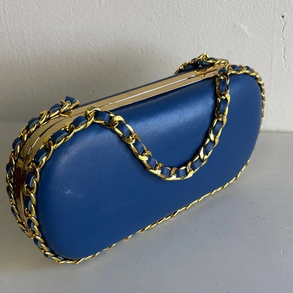 Chic Blue Pill Clutch with Gold Chain Accent